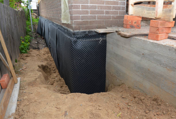 SJ Waterproofing Pros technician performing targeted Waterproofing assessment in Allegan, MI